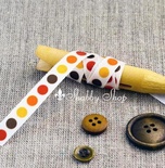 Стрічка American Crafts біла у жовті, помаранчеві, червоні та коричневі кружечки, ширина 9,5мм, 90 см