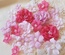 Набір квітів з тканини ручної роботи, коралово - рожевий, розмір 2см - 4,5см, 21 шт.