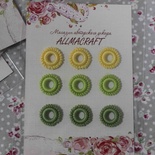 Декоративні в’язані колечки — у Набірі від Allmacraft, жовтий, зелений, оливковий, 9 шт.