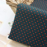 Кольорова бавовна темно - зелена в цегляно - помаранчевий горошок, розмір:45 x55см