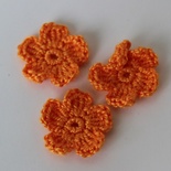 В’язана квітка ручної роботи, колір помаранчевий, 2,5см, 1шт.
