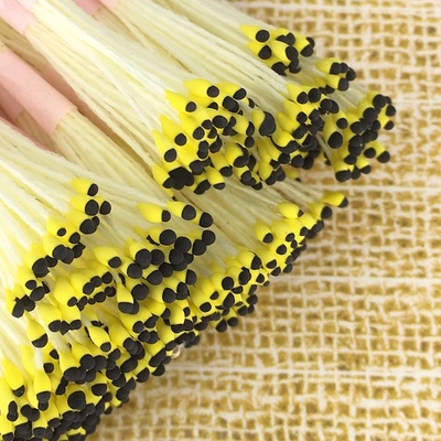 Тайские двусторонние тычинки с каплевидными головками, цвет желто-черный, в пучке 46-52 шт.