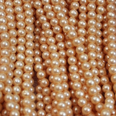 Намистини «перлини» на нитці, 135 намистинки, колір персиковий, діаметр 6 мм