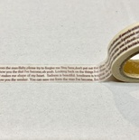 Паперовий скотч на клейовій основі, білий з друкованим текстом, 15мм х 10м