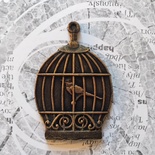 Пластикова прикраса "Пташка в клітці" під античне золото від E.В.A., 5,5x3,7см, 1 шт.