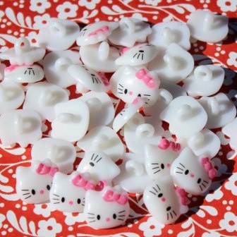 Біла полоховичка "Hello Kitty", 10мм, 1 шт.