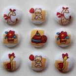 Тканинні ґудзики від Allmacraft - серія Іграшки, діаметр 2см, 9 штук