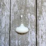 Юла, пластикова прикраса від E.В.A., біла, 2x3см